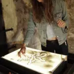 Teamuitje met zand toveren