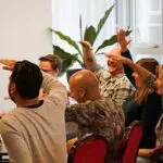 Rap workshop met elkaar rappen.