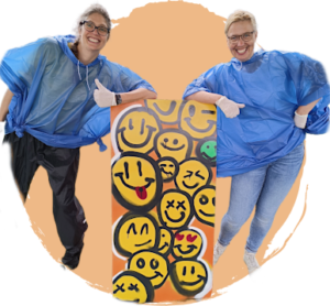 Deze deelnemers zijn trots op hun zelf gemaakte graffiti piece